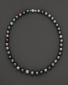 Darkly shimmering Tahitian pearls with 14K. white gold. Darkly shimmering Tahitian pearls with 14K. white gold.