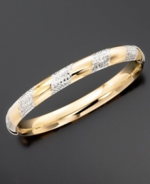 Diamond-cutting adds a sparkly edge to an elegant 14k gold over sterling silver and sterling silver bangle bracelet. Diamond-cutting adds a sparkly edge to an elegant 14k gold over sterling silver and sterling silver bangle bracelet.