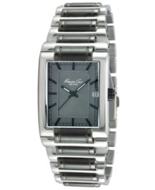 Take the time to appreciate iconic style. This Kenneth Cole New York watch features a silvertone and gunmetal ion-plated stainless steel bracelet and rectangular case. Gunmetal gray dial with dark gray stick indices, logo and date window. Analog movement. Water resistant to 30 meters. Limited lifetime warranty. Take the time to appreciate iconic style. This Kenneth Cole New York watch features a silvertone and gunmetal ion-plated stainless steel bracelet and rectangular case. Gunmetal gray dial with dark gray stick indices, logo and date window. Analog movement. Water resistant to 30 meters. Limited lifetime warranty.