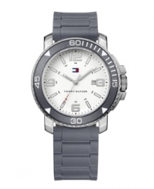 Keep your cool with this ultra-stylish and monochromatic sport watch by Tommy Hilfiger. Gray silicone strap and round silver tone mixed metal case with gray bezel. White dial features applied silver tone numerals at twelve, three, six and nine o'clock, stick indices, date window at three o'clock, three hands and logo. Quartz movement. Water resistant to 30 meters. Ten-year limited warranty. Keep your cool with this ultra-stylish and monochromatic sport watch by Tommy Hilfiger. Gray silicone strap and round silver tone mixed metal case with gray bezel. White dial features applied silver tone numerals at twelve, three, six and nine o'clock, stick indices, date window at three o'clock, three hands and logo. Quartz movement. Water resistant to 30 meters. Ten-year limited warranty.