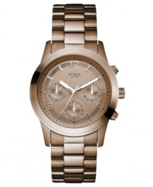A classic design with a modern hue: this GUESS watch is built with chronograph dials with stopwatch and international time functions. A classic design with a modern hue: this GUESS watch is built with chronograph dials with stopwatch and international time functions.