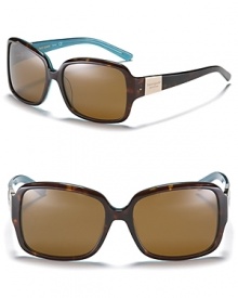 Your summer look isn't complete without a stylish pair of oversized rectangle sunglasses from Kate Spade. With contrast interior for a fun pop of color. Your summer look isn't complete without a stylish pair of oversized rectangle sunglasses from Kate Spade. With contrast interior for a fun pop of color.