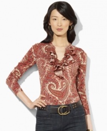 Rendered in a lightweight cotton knit, Lauren Jeans Co.'s soft top features a tiered ruffle trim along the neckline for feminine charm. Rendered in a lightweight cotton knit, Lauren Jeans Co.'s soft top features a tiered ruffle trim along the neckline for feminine charm.