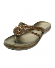 The Kenneth Cole Reaction Glam Life Sandals manage casual cool without sacrificing any sparkle thanks to their elaborately beaded thong upper. The Kenneth Cole Reaction Glam Life Sandals manage casual cool without sacrificing any sparkle thanks to their elaborately beaded thong upper.