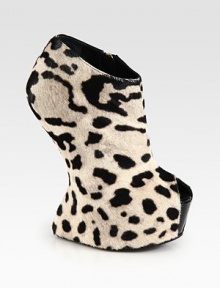 A timeless peep toe completes this leopard-printed calf hair silhouette on a sculpted wedge. Self-covered wedge, 6½ (165mm)Hidden platform, 2 (50mm)Compares to a 4½ heel (115mm)Calf hair upperPeep toeSide zipLeather liningLeather sole with a rubber insertPadded insoleMade in Italy A timeless peep toe completes this leopard-printed calf hair silhouette on a sculpted wedge. Self-covered wedge, 6½ (165mm)Hidden platform, 2 (50mm)Compares to a 4½ heel (115mm)Calf hair upperPeep toeSide zipLeather liningLeather sole with a rubber insertPadded insoleMade in Italy