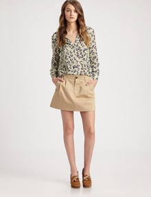 Bold leopard spots pop on this elegant silk topper.Tie-front split V neckLong gathered sleevesStraight hemAbout 22¾ from shoulder to hemSilkDry cleanImportedModel shown is 5'11 (180cm) wearing US size Small. Bold leopard spots pop on this elegant silk topper.Tie-front split V neckLong gathered sleevesStraight hemAbout 22¾ from shoulder to hemSilkDry cleanImportedModel shown is 5'11 (180cm) wearing US size Small.