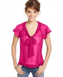 Designed in intense hues, this sheer bow blouse from Lily White adds ladylike charm to your toughest skinny jeans! Designed in intense hues, this sheer bow blouse from Lily White adds ladylike charm to your toughest skinny jeans!