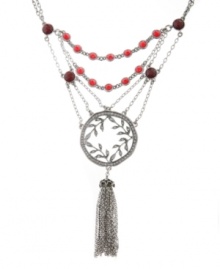 Up-to-the-minute and unique. A tassel embellishment makes Lucky Brand's necklace trendy, while its layered chains and leaf medallion add distinctive detailing. Adorned with semiprecious ruby-hued jade and colored crystals, it's crafted in silver tone mixed metal. Approximate length: 18 inches + 2-inch extender. Approximate drop: 6-1/4 inches. Up-to-the-minute and unique. A tassel embellishment makes Lucky Brand's necklace trendy, while its layered chains and leaf medallion add distinctive detailing. Adorned with semiprecious ruby-hued jade and colored crystals, it's crafted in silver tone mixed metal. Approximate length: 18 inches + 2-inch extender. Approximate drop: 6-1/4 inches.