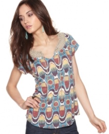 A tribal-inspired print and crochet trim at the neckline make for a bohemian-inspired top from Lucky Brand Jeans. Perfect for a summer soiree with denim shorts! A tribal-inspired print and crochet trim at the neckline make for a bohemian-inspired top from Lucky Brand Jeans. Perfect for a summer soiree with denim shorts!