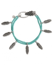 Turn over a stylish new leaf. This charm bracelet from Lucky Brand is crafted from silver-tone mixed metal with turquoise beads and leaf accents adding a whimsical pop. Approximate length: 7-5/8 inches. Turn over a stylish new leaf. This charm bracelet from Lucky Brand is crafted from silver-tone mixed metal with turquoise beads and leaf accents adding a whimsical pop. Approximate length: 7-5/8 inches.