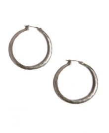 Every girl must own the perfect pair of hoops. Complementary to any ensemble, these Lucky Brand earrings feature a small-sized hoop with a hammered surface in silver tone mixed metal. Approximate diameter: 1-3/4 inches. Every girl must own the perfect pair of hoops. Complementary to any ensemble, these Lucky Brand earrings feature a small-sized hoop with a hammered surface in silver tone mixed metal. Approximate diameter: 1-3/4 inches.