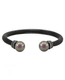 Eternally elegant. Whether you wear it for daytime or evening, Majorica's stainless steel bangle bracelet with organic man-made black pearls will stand out as a timeless and tasteful finishing touch. Approximate diameter: 2-1/2 inches. Eternally elegant. Whether you wear it for daytime or evening, Majorica's stainless steel bangle bracelet with organic man-made black pearls will stand out as a timeless and tasteful finishing touch. Approximate diameter: 2-1/2 inches.