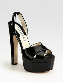Lifted by a towering heel and platform, this patent leather stunner has a stretchy slingback strap and padded insole. Self-covered heel, 5½ (140mm)Covered platform, 2 (50mm)Compares to a 3½ heel (90mm)Patent leather upperLeather lining and solePadded insoleMade in ItalyOUR FIT MODEL RECOMMENDS ordering one size up as this style runs small. Lifted by a towering heel and platform, this patent leather stunner has a stretchy slingback strap and padded insole. Self-covered heel, 5½ (140mm)Covered platform, 2 (50mm)Compares to a 3½ heel (90mm)Patent leather upperLeather lining and solePadded insoleMade in ItalyOUR FIT MODEL RECOMMENDS ordering one size up as this style runs small.
