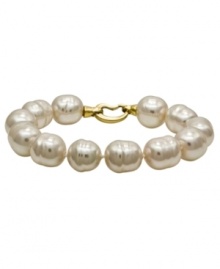 From the island of Mallorca, Spain, this bracelet features white baroque organic man-made pearls (14 mm) with an 18k gold over sterling silver clasp. Approximate length: 7-1/2 inches. From the island of Mallorca, Spain, this bracelet features white baroque organic man-made pearls (14 mm) with an 18k gold over sterling silver clasp. Approximate length: 7-1/2 inches.