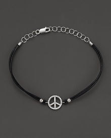Diamonds, set in white gold, form a dazzling peace sign on this leather bracelet from Meira T. Diamonds, set in white gold, form a dazzling peace sign on this leather bracelet from Meira T.