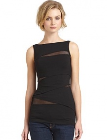 THE LOOKBoatneckSleeveless Asymmetrical tiered detailsMesh accentsTHE FITAbout 28 from shoulder to hemTHE MATERIALRayon/spandexCARE & ORIGINDry cleanMade in USAModel shown is 5'10 (177cm) wearing US size Small. THE LOOKBoatneckSleeveless Asymmetrical tiered detailsMesh accentsTHE FITAbout 28 from shoulder to hemTHE MATERIALRayon/spandexCARE & ORIGINDry cleanMade in USAModel shown is 5'10 (177cm) wearing US size Small.