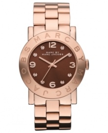 A captivating change of pace: a rosy-hued timepiece from Marc by Marc Jacobs.