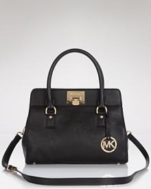 Carry effortless glamor with this leather day bag from MICHAEL Michael Kors. Crafted of rich leather this satchel flaunts versatile style and a perfectly proportioned design.