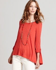Lined with a seamless lockstitched shapewear tank to slim the figure, this draped Miraclebody by Miraclesuit top blends everyday chic with flattering comfort. Lined with a seamless lockstitched shapewear tank to slim the figure, this draped Miraclebody by Miraclesuit top blends everyday chic with flattering comfort.