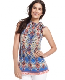 Style&co. balances a vibrant print with a sophisticated tie-neck silhouette for this sleeveless blouse. A cinch to pair with sleek black or white pants. Style&co. balances a vibrant print with a sophisticated tie-neck silhouette for this sleeveless blouse. A cinch to pair with sleek black or white pants.