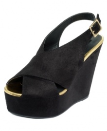 Thick crisscrossing straps atop a chunky heel give the Wonder wedge sandals by Material Girl a cool, unique look. Pair them with skinnies or a flouncy skirt and add some stylish height to your day. Thick crisscrossing straps atop a chunky heel give the Wonder wedge sandals by Material Girl a cool, unique look. Pair them with skinnies or a flouncy skirt and add some stylish height to your day.