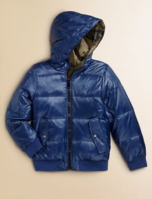Weather-resistant nylon on one side, smart checks on the other, both quilted, both sporty, both ready to keep your young man stylishly warm.Attached hoodFront zipperLong sleeves with ribbed knit cuffsEmbroidered chest logo on solid sideAngled front pocketsRibbed knit waistbandNylonMachine washImported Weather-resistant nylon on one side, smart checks on the other, both quilted, both sporty, both ready to keep your young man stylishly warm.Attached hoodFront zipperLong sleeves with ribbed knit cuffsEmbroidered chest logo on solid sideAngled front pocketsRibbed knit waistbandNylonMachine washImported
