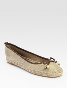Timeless espadrille design in stretchy metallic canvas with smooth leather trim and dainty ties. Metallic canvas and leather upperHemp liningRubber soleImported Timeless espadrille design in stretchy metallic canvas with smooth leather trim and dainty ties. Metallic canvas and leather upperHemp liningRubber soleImported