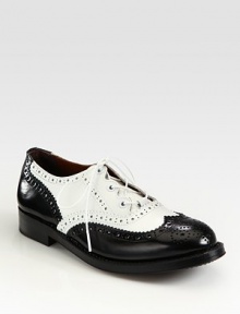 Traditional perforations, two-tone leather upper and a lace-up front enliven this menswear-inspired favorite. Stacked heel, 1 (25mm)Leather upperLeather lining and solePadded insoleImported Traditional perforations, two-tone leather upper and a lace-up front enliven this menswear-inspired favorite. Stacked heel, 1 (25mm)Leather upperLeather lining and solePadded insoleImported