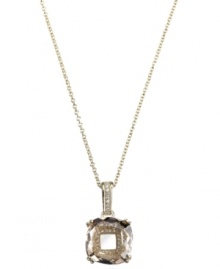 Sparkling and stunning. CRISLU's pendant necklace features a large-scale clear cubic zirconia complemented by glittering cubic zirconia accents (5-1/2 ct. t.w.). Set in 18k gold over sterling silver. Approximate length: 16 inches + 2-inch extender. Approximate drop: 5/8 inch. Sparkling and stunning. CRISLU's pendant necklace features a large-scale clear cubic zirconia complemented by glittering cubic zirconia accents (5-1/2 ct. t.w.). Set in 18k gold over sterling silver. Approximate length: 16 inches + 2-inch extender. Approximate drop: 5/8 inch.