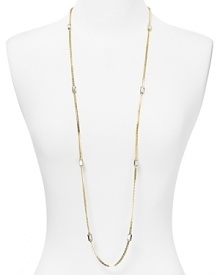 Simply designed and plated in high-shine metal, this Michael Kors link necklace styles every look with classic glamor. Simply designed and plated in high-shine metal, this Michael Kors link necklace styles every look with classic glamor.
