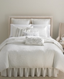 The Shimmer king sham from Martha Stewart Collection features an attractive blossom jacquard pattern over a silvery ombré ground. Soft piping completes this elegant design. The Shimmer king sham from Martha Stewart Collection features an attractive blossom jacquard pattern over a silvery ombré ground. Soft piping completes this elegant design.