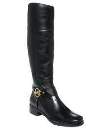 Charmed, I'm sure. MICHAEL Michael Kors' Fulton Harness boots feature a metallic designer logo charm on the strapped ankle harness, adding a sense of shine to an otherwise polished style. Charmed, I'm sure. MICHAEL Michael Kors' Fulton Harness boots feature a metallic designer logo charm on the strapped ankle harness, adding a sense of shine to an otherwise polished style.