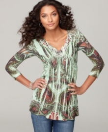 A sheer lace back adds intrigue to One World's printed empire waist top! Try it with jeans and a pair of earrings for a great anytime look. A sheer lace back adds intrigue to One World's printed empire waist top! Try it with jeans and a pair of earrings for a great anytime look.