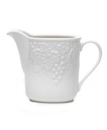 Taste of the country. Hardy stoneware embossed with a fruit and flora motif makes the English Country creamer a graceful go-to for every day.