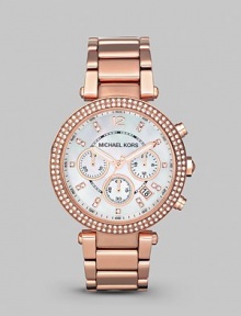 This warm rose gold timepiece shines with a crystal bezel. Quartz movement Water resistant to 5 ATM Round rose goldplated stainless steel case, 39mm (1.5) Crystal bezel Mother-of-pearl dial Arabic numeral and bar hour markers Second hand Rose goldplated stainless steel link bracelet Imported This warm rose gold timepiece shines with a crystal bezel. Quartz movement Water resistant to 5 ATM Round rose goldplated stainless steel case, 39mm (1.5) Crystal bezel Mother-of-pearl dial Arabic numeral and bar hour markers Second hand Rose goldplated stainless steel link bracelet Imported