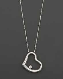 From the Tiny Treasures collection, a diamond accented heart necklace with signature ruby accent. Designed by Roberto Coin. From the Tiny Treasures collection, a diamond accented heart necklace with signature ruby accent. Designed by Roberto Coin.