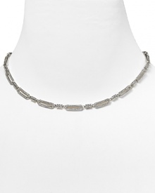 Stand out from the in-crowd in this silvery link collar necklace from Nadri, decked in delicate crystals. This vintage-inspired piece is an elegance epitomized. Stand out from the in-crowd in this silvery link collar necklace from Nadri, decked in delicate crystals. This vintage-inspired piece is an elegance epitomized.