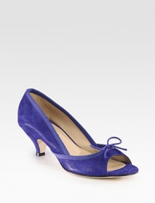 Lustrous metallic suede peep toe with a dainty string bow and classic kitten heel. Self-covered heel, 2 (50mm)Metallic suede upperLeather liningBuffed leather solePadded insoleMade in FranceOUR FIT MODEL RECOMMENDS ordering one size up as this style runs small. Lustrous metallic suede peep toe with a dainty string bow and classic kitten heel. Self-covered heel, 2 (50mm)Metallic suede upperLeather liningBuffed leather solePadded insoleMade in FranceOUR FIT MODEL RECOMMENDS ordering one size up as this style runs small.