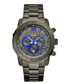 Bright blue electrifies this monochromatic chronograph watch by GUESS. Bright blue electrifies this monochromatic chronograph watch by GUESS.