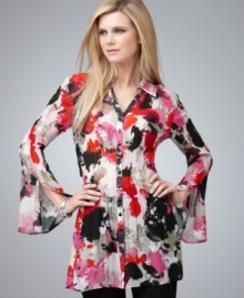 Add boho-chic flair to your wardrobe with Style&co.'s flowing tunic top! The split cuffs and textured fabric give this piece subtle and appealing detail. Add boho-chic flair to your wardrobe with Style&co.'s flowing tunic top! The split cuffs and textured fabric give this piece subtle and appealing detail.