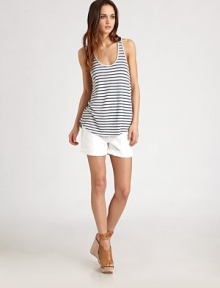 A shirttail hem adds a touch of menswear-inspired design to this striped style. ScoopneckSleevelessShirttail hem94% rayon/6% nylonHand washImportedModel shown is 5'10 (177cm) wearing US size Small. A shirttail hem adds a touch of menswear-inspired design to this striped style. ScoopneckSleevelessShirttail hem94% rayon/6% nylonHand washImportedModel shown is 5'10 (177cm) wearing US size Small.