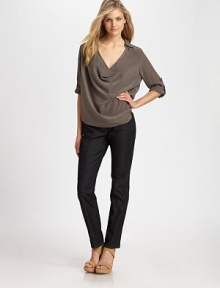 The epitome of feminine, a glamorously draped neckline meets a classic collar design and a flattering boxy fit is completed by a curved hem. Collar neckDraped frontButton-tab sleevesCurved hemPleat detail at back yokeAbout 26 from shoulder to hemSilkDry cleanImported Model shown is 5'10 (177cm) wearing US size Small. The epitome of feminine, a glamorously draped neckline meets a classic collar design and a flattering boxy fit is completed by a curved hem. Collar neckDraped frontButton-tab sleevesCurved hemPleat detail at back yokeAbout 26 from shoulder to hemSilkDry cleanImported Model shown is 5'10 (177cm) wearing US size Small.