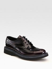 Leather wing-tip style with rubber sole and colored micro detail.Leather upperLeather liningRubber soleMade in Italy Leather wing-tip style with rubber sole and colored micro detail.Leather upperLeather liningRubber soleMade in Italy