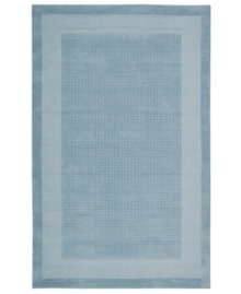 In cool, ocean blue, this calming rug turns any space into a serene setting. A distinctive center grid gives the rug a delightful texture while coordinating well with both traditional and modern interiors. Hand-tufted of wool for premium softness and durability. In cool, ocean blue, this calming rug turns any space into a serene setting. A distinctive center grid gives the rug a delightful texture while coordinating well with both traditional and modern interiors. Hand-tufted of wool for premium softness and durability.