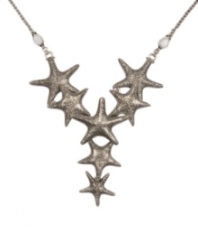 Adorn your neckline with a summery touch. Lucky Brand's Y-shaped starfish necklace comes in textured silver tone mixed metal. Approximate length: 22 inches. Approximate drop: 3-3/4 inches. Adorn your neckline with a summery touch. Lucky Brand's Y-shaped starfish necklace comes in textured silver tone mixed metal. Approximate length: 22 inches. Approximate drop: 3-3/4 inches.