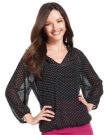A petite polka dot print is a fun-but-sophisticated finish on Sunny Leigh's latest blouse. A petite polka dot print is a fun-but-sophisticated finish on Sunny Leigh's latest blouse.