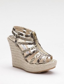 Ultra exotic, this strappy style in snake-printed metallic leather zips up the front and perches atop an espadrille platform wedge.Rope-covered wedge, 4¾ (120mm) Covered platform, 1½ (40mm) Compares to a 3¼ heel (80mm) Leather upper Front zipper Leather lining Padded insole Rubber sole Made in ItalyOUR FIT MODEL RECOMMENDS ordering true whole size; ½ sizes should order the next whole size up. Ultra exotic, this strappy style in snake-printed metallic leather zips up the front and perches atop an espadrille platform wedge.Rope-covered wedge, 4¾ (120mm) Covered platform, 1½ (40mm) Compares to a 3¼ heel (80mm) Leather upper Front zipper Leather lining Padded insole Rubber sole Made in ItalyOUR FIT MODEL RECOMMENDS ordering true whole size; ½ sizes should order the next whole size up.