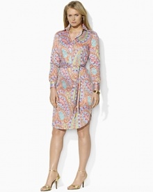 A classic shirtdress is rendered in bold paisley cotton poplin and finished with a self-belt waist for a figure-flattering fit. A classic shirtdress is rendered in bold paisley cotton poplin and finished with a self-belt waist for a figure-flattering fit.
