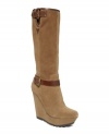 Stand and deliver your best strut in the Illana wedge boots. GUESS by Marciano perfected these boots by covering the wedge for leg-lengthening fabulousness.