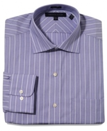 Bring a dapper new twist to your dress wardrobe with this crisp striped shirt from Tommy Hilfiger. Bring a dapper new twist to your dress wardrobe with this crisp striped shirt from Tommy Hilfiger.